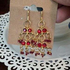 Beautiful Gold Tone Dangling Ladies Earrings With Red Stones